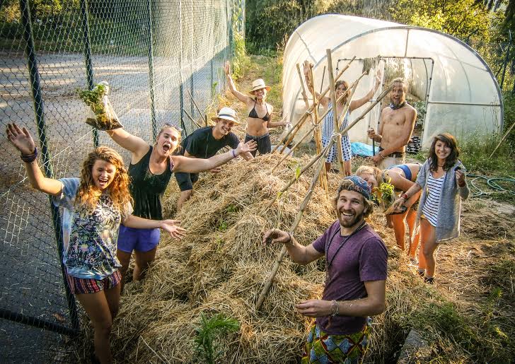 A group of WWOOF volunteers working together in Portugal, sharing their cultures as they also develop as global citizens. (image © Courtesy of WWOOF.net)