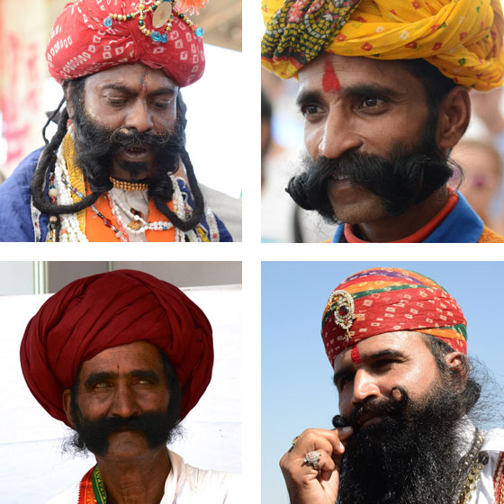 Four entrants in the Pushkar Camel Fair mustache competition in Rajasthan, India, a place for travel adventures. (Image © Meredith Mullins.)
