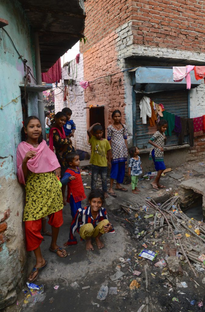 A group of Kathputli Colony dwellers, showing cultural encounters in the slums of India. (Image © Meredith Mullins.)