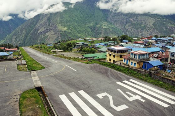 Tenzing-Hillary airport in Lukla, offering travel adventures and air travel stories of a lifetime. (Image © Vernacht/iStock.)
