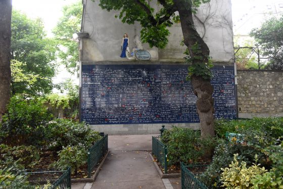 The Wall of Love in Montmartre Paris, showing us many ways to say I love you. (Image © Meredith Mullins.)