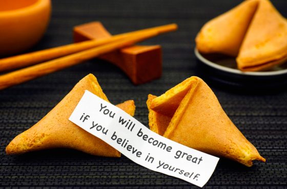 Paper strip with one of the proverbs and sayings of fortune cookies, You Will Become Great If You Believe in Yourself. (Image © EKaterina79/iStock.)