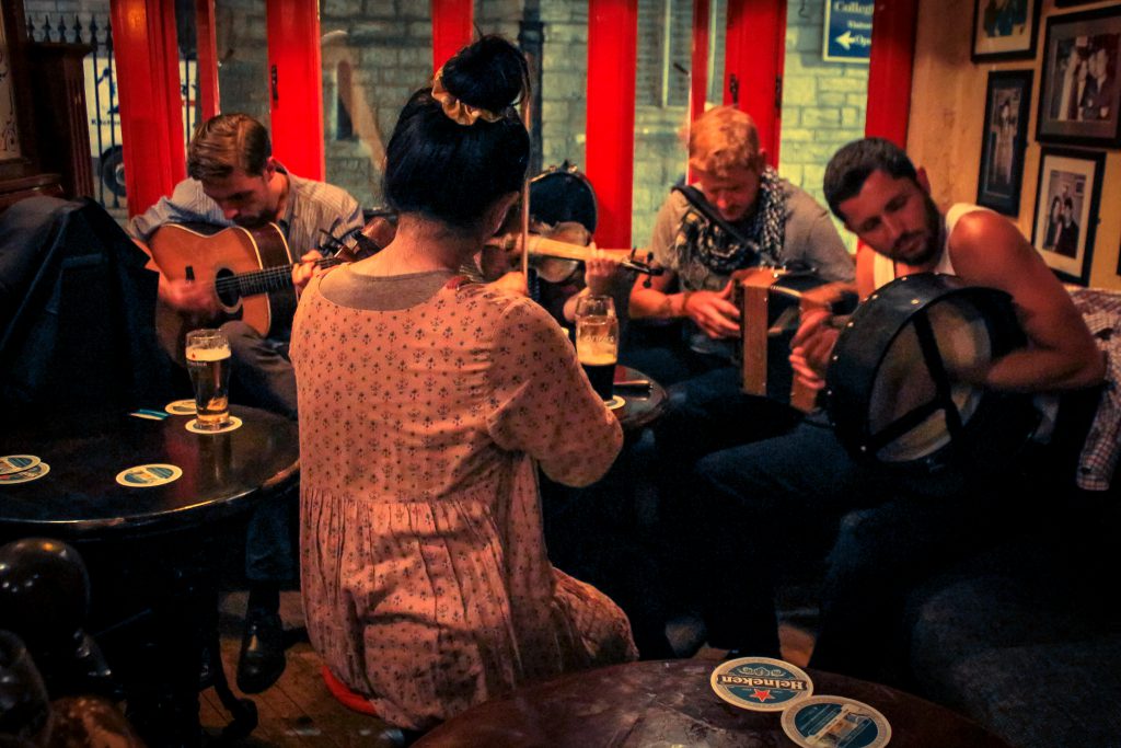Musicians at a jam session in pub in Galway, Ireland reflect the Irish tradition of the party piece, sharing songs, stories, and poems. (Image by Damián Bakarcic)