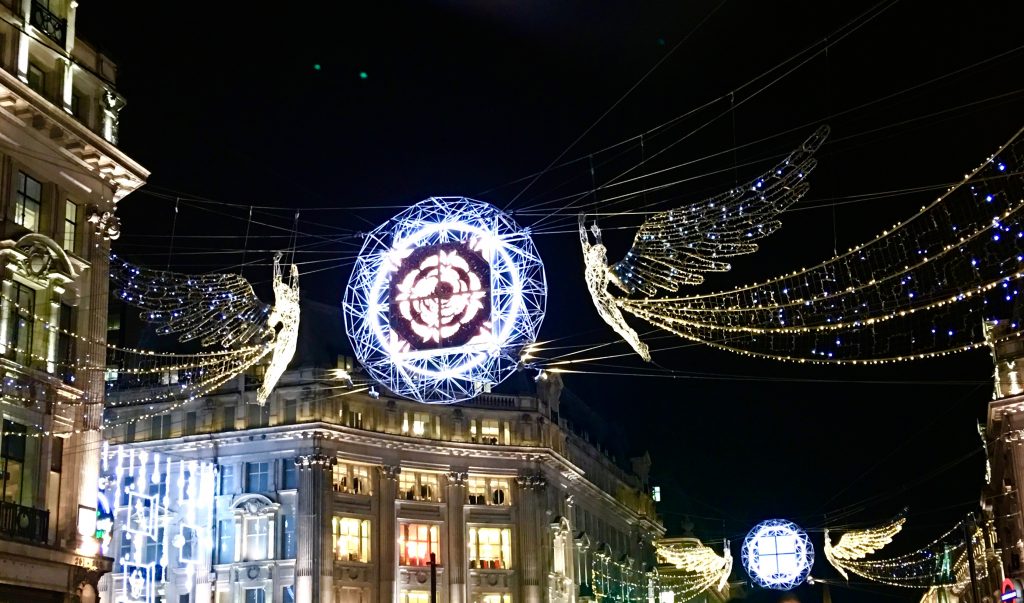 Angelic decorations over Regent St, London inspire wanderlust for an English holiday ramble. (Image © Joyce McGreevy)