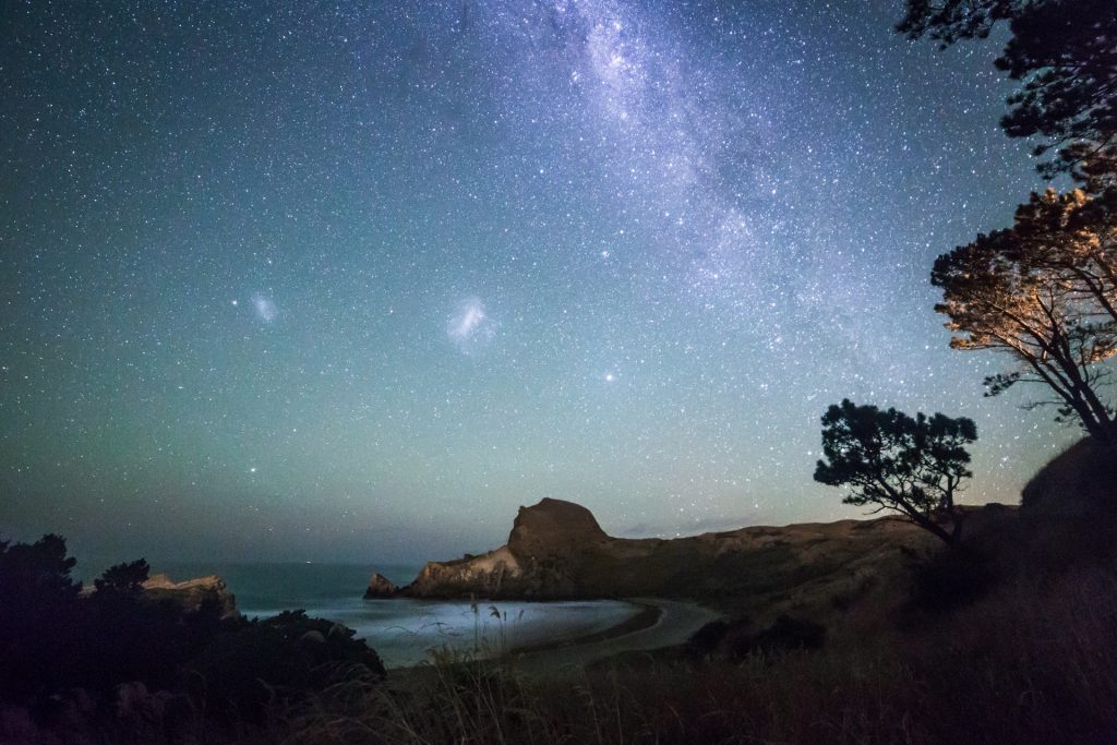 A starry sky in Castlepoint, Wairarapa, New Zealand inspires an author to consider the true nature of time travel adventures. (Image © Daniel Rood and New Zealand Tourism)