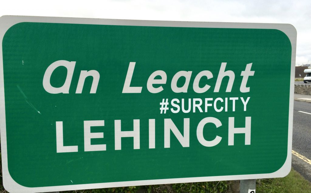 A sign in Lahinch, Co. Clare shows that despite cultural stereotypes, surfing is popular in Ireland. (Image © Joyce McGreevy)
