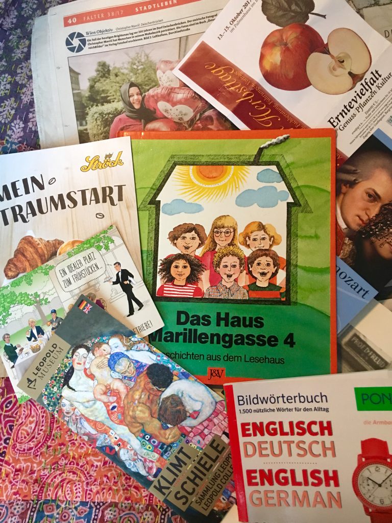 Assorted German-language reading materials inspire a writer in Vienna who misses speaking two languages. (Image © Joyce McGreevy)