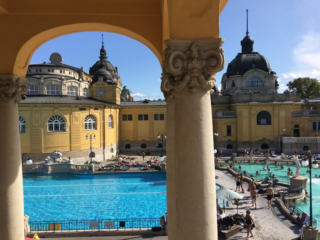 Bathers at Szechenyi Spa inspire a travel tip: discover the thermal baths of Budapest. Image © Joyce McGreevy
