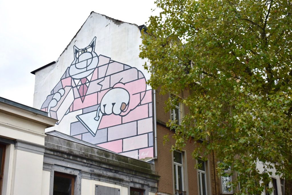 A mural of Philippe Geluck's "Le Chat" in Brussels shows why comic-book art is a popular cultural tradition in Belgium. (Image © Joyce McGreevy)