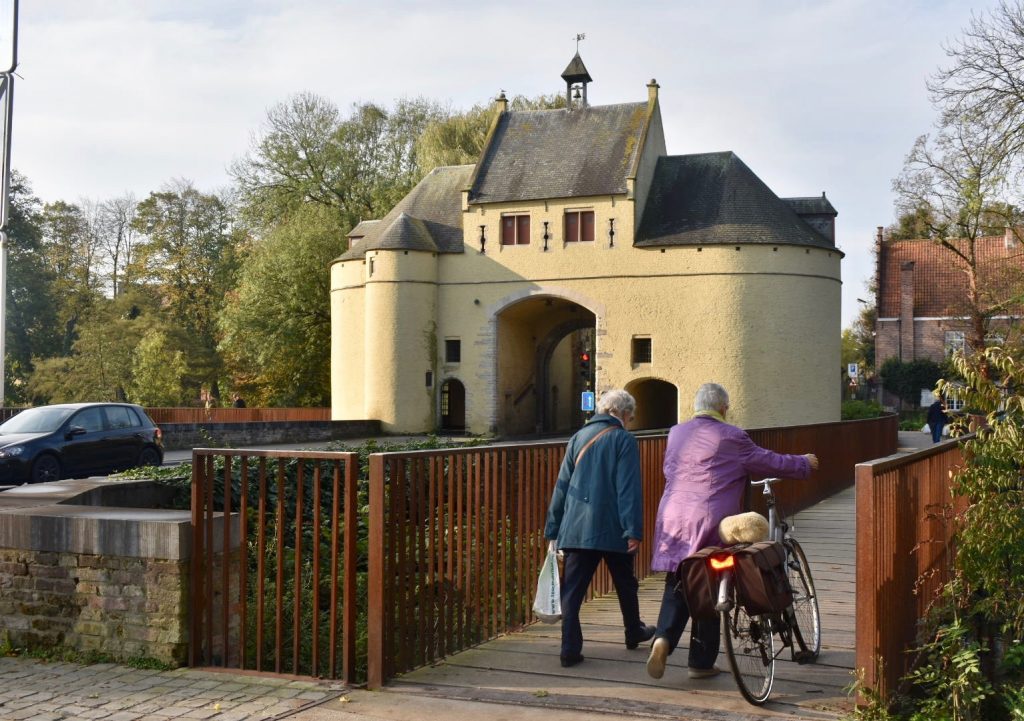 Smedenpoort Gate in Bruges, inspires a traveler in Belgium. (Image © Joyce McGreevy)