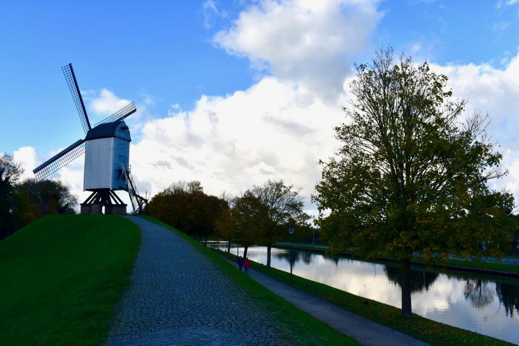 A windmill in Bruges inspires a bilingual writer in Belgium. (Image © Joyce McGreevy)