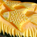 Pumpkin with a fish bas-relief made by food carving