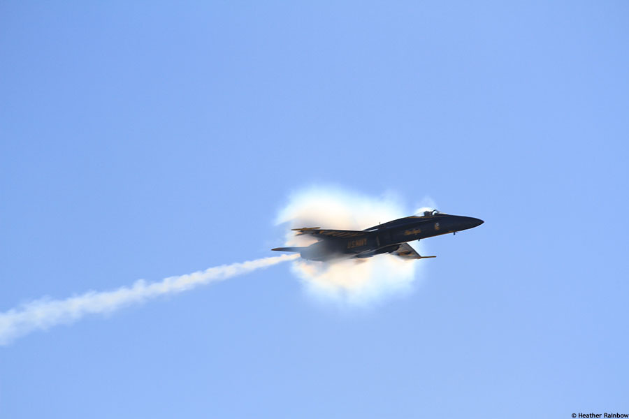 Blue Angel with vapor cloud occurring right before breaking the sound barrier, illustrating photographic space explorations