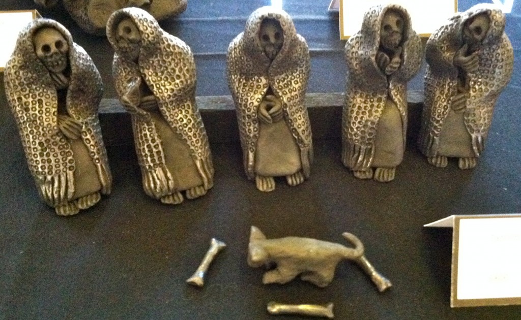 Five abuelas, dog, and bone sculpture, providing a cultural encounter with Mexico's calacas (skeleton sculptures) by Oaxacan artist