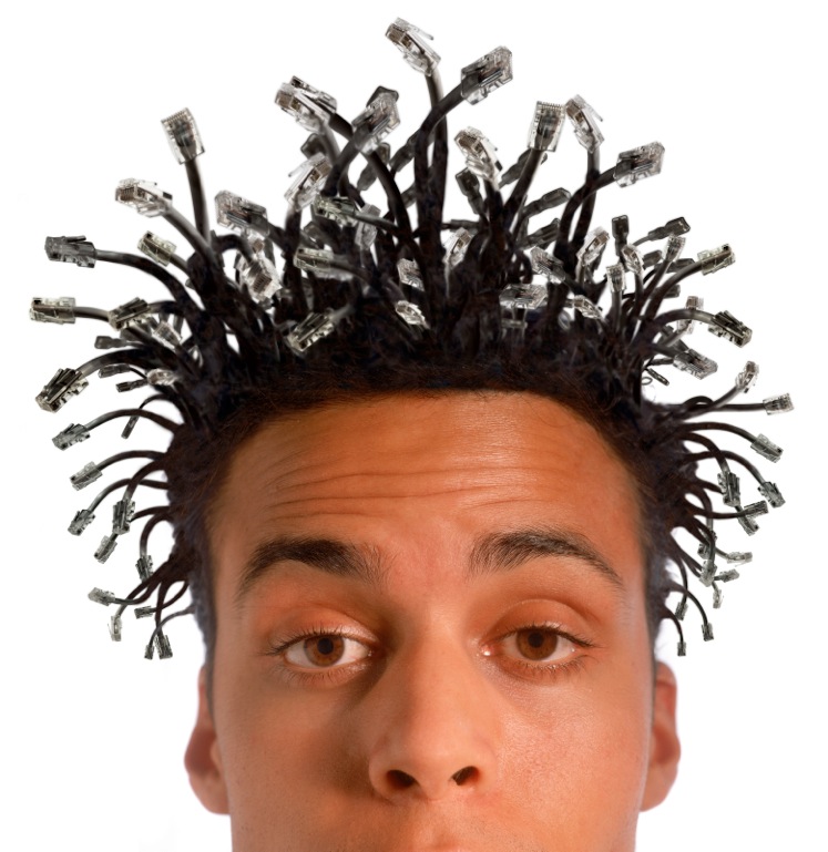 man with plugs in his hair, showing overuse of technology in everyday life