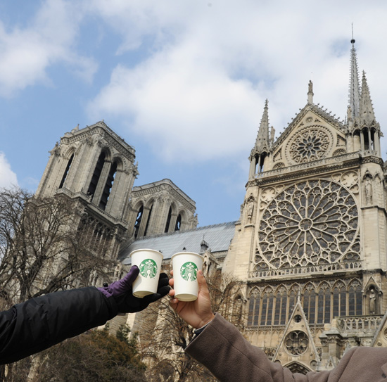Starbucks coffee in the shadow of Notre Dame, a cultural experience that blends the old with the new.