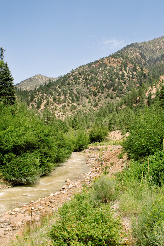 mountain and river scene where hunting for treasure can offer life-changing experiences