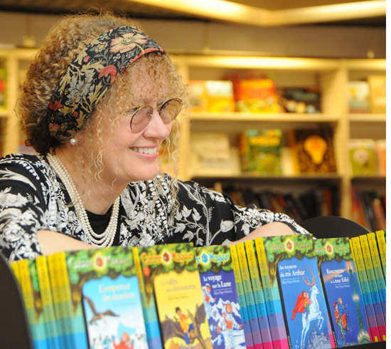 Mary Pope Osborne at Paris bookstore, providing creative inspiration with Magic Treehouse series.