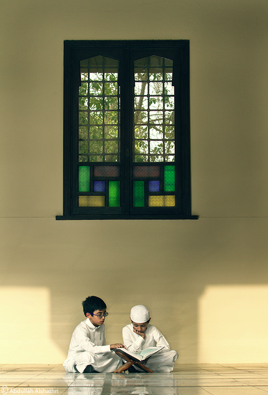 reading the Quran during Ramadan, illustrating cultural traditions