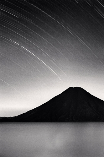 volcano with star trails, creative inspiration from Michael Kenna