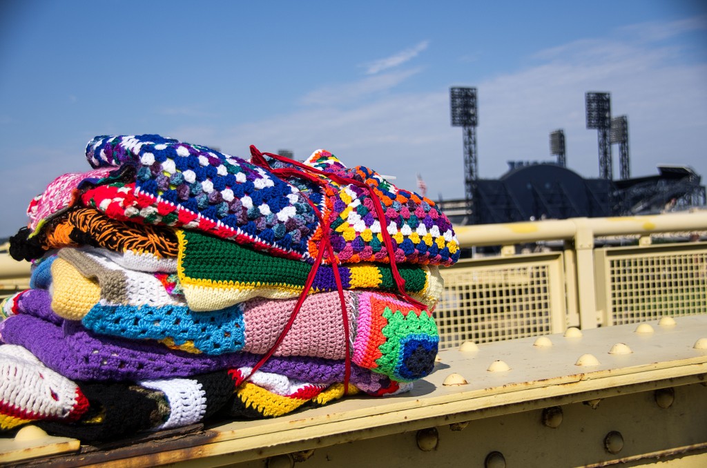 Knit panels for yarn bombing the Andy Warhol bridge in a Pittsburg public art project. Image © Jay Ressler
