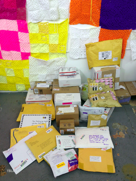 Incoming mail, containing knitted squares for a yarn bombing public art project at LA's Craft and Folk Art Museum. Image © Yarn Bombing Los Angeles