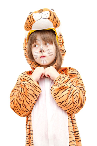 girl in tiger costume, part of Halloween traditions and cultural traditions in the U.S.