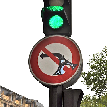 Eiffel tower turn sign, artistic expression by a street artist (Image © Sherry Long)