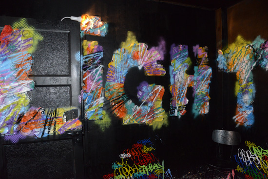Light spelled in paint cans, artistic expression of street art at the Tour 13 (Photo © Meredith Mullins)