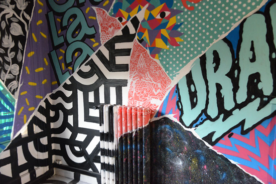 Collage of color on walls and radiator, artistic expression of street art at the Tour 13 (Photo © Meredith Mullins)