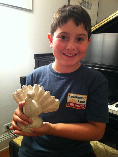Asher Weintraub with a menurkey, crossing cultures with a combination of Thanksgiving and Hanukkah
