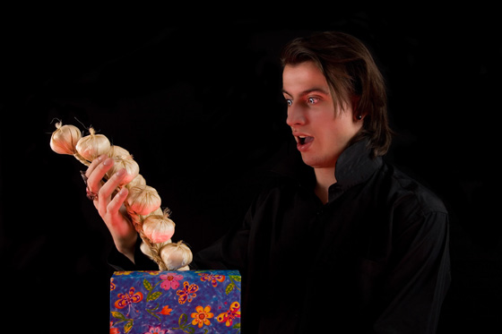 Shocked vampire taking garlic out of a gift box, illustrating bad gift giving. (Image © Elisanth_ / iStock) 