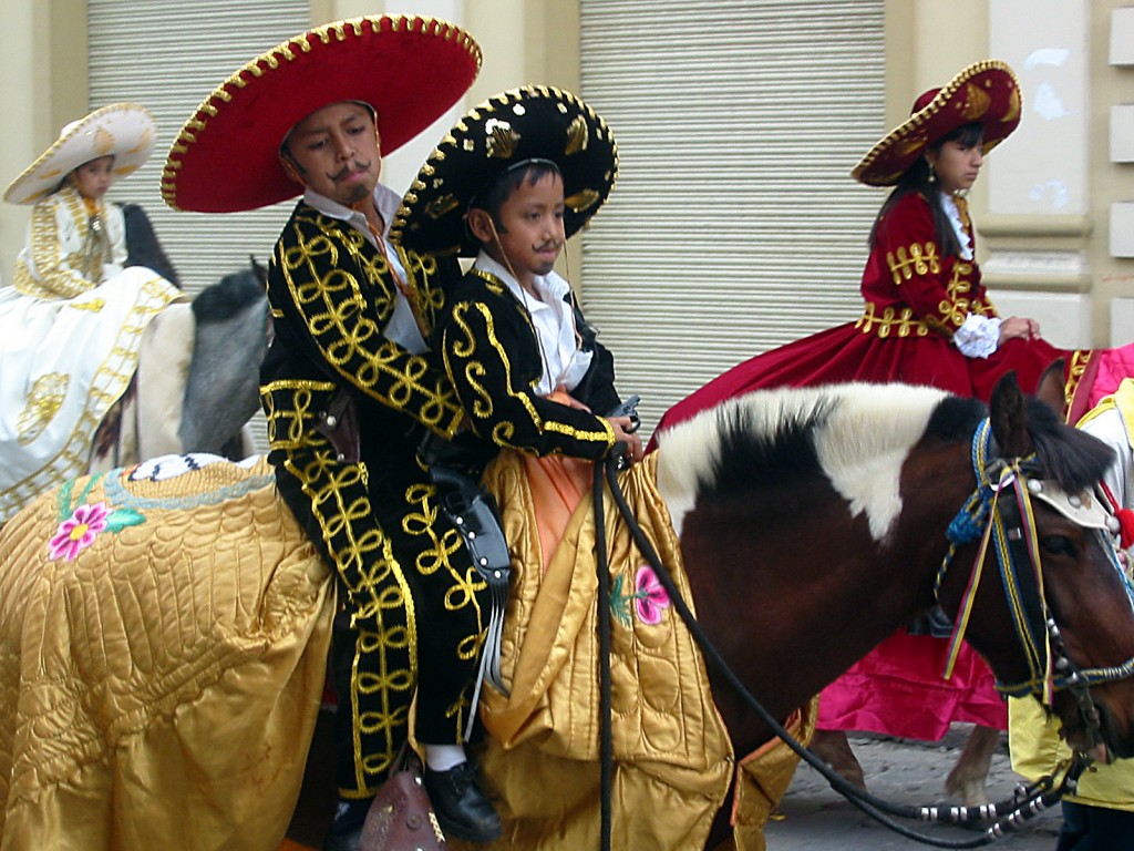 Children's parade in Cuenca, Ecuador, the beauty of which prompted the author to shift life goals for language learning. (Image © Bruce Goldstone)