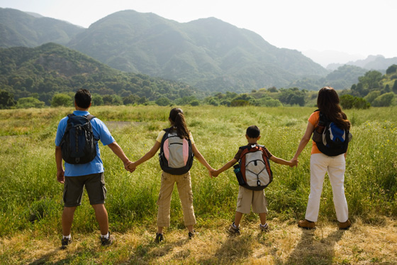 Family on a hike together, illustrating how time together is the best idea for gift giving.