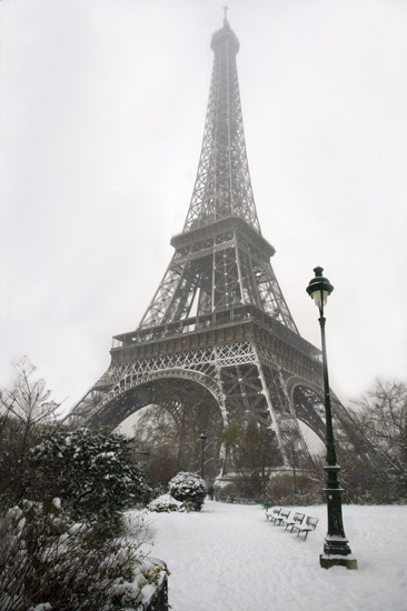 Snow at the Eiffel Tower showing life lessons and memorable moments in Paris from the 2013 year in review (Photo © Meredith Mullins)