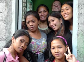 Women in the Philippines overcoming obstacles through work on handmade cards. (Image © Sanctuary Spring/Good Paper)