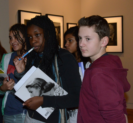 Student group in gallery, getting creative inspiration from 20th century heroes (Photo © Meredith Mullins)