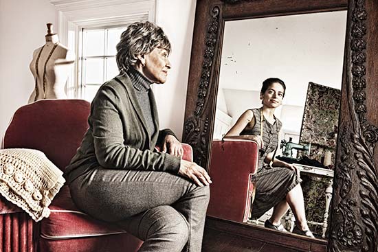 A seamstress sees her younger self reflected in mirror, one of a series of creative pictures by Tom Hussey on aging. (Photo © Tom Hussey)
