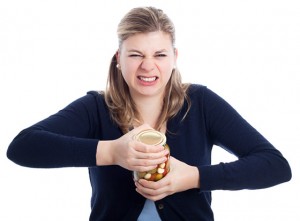 A woman trying to open a jar models one way a mnemonic device can be a useful life hack.