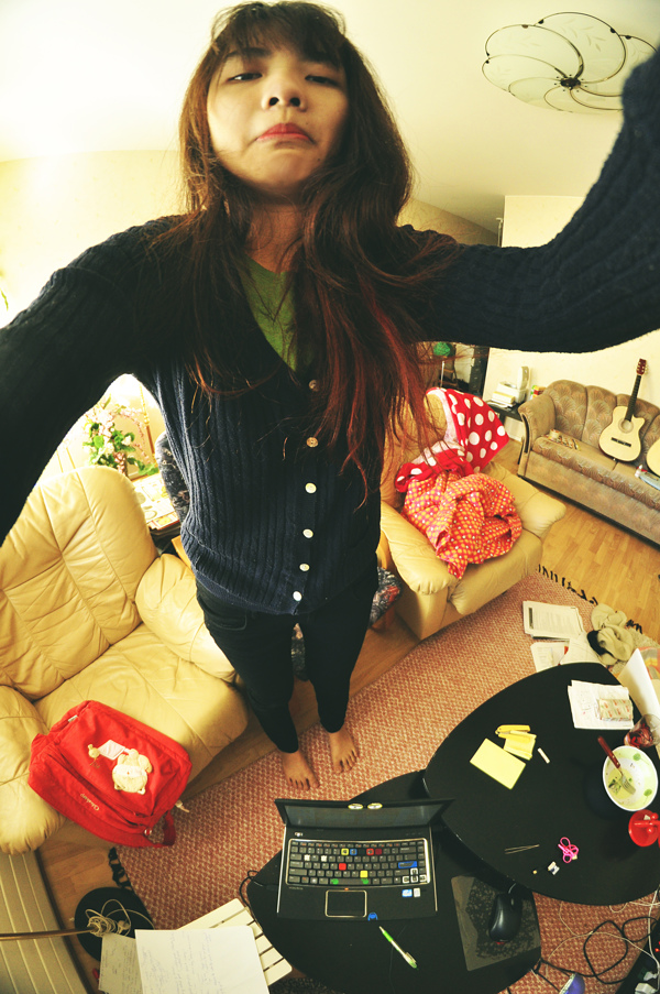 Selfie of a girl in her living room taken at an overhead angle to increase creative expression. (Image © Hoang Minh Trang)