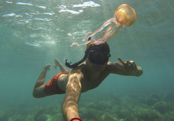 An underwater selfie, showing creative expression. (Image © Niccolo Simoncini/iStock)