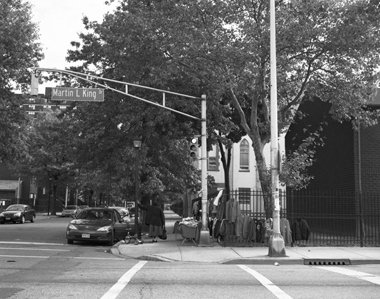 Crosswalk and street signs on Martin Luther King, Jr. Drive in Jersey City, NJ, artistic expression by Susan Berger on a photographic journey to capture images of America (© Susan Berger)