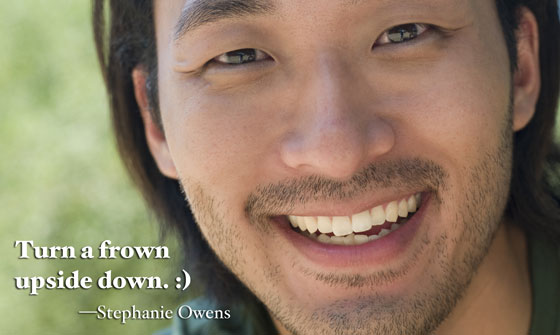 Smiling man illustrate this good advice to live life well: Turn a frown upside down. :)