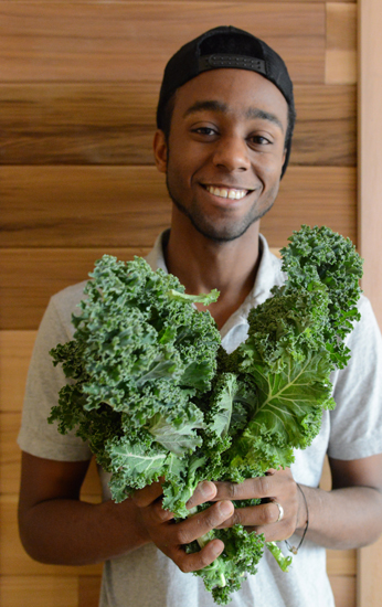 Jay with kale leaves, the result of the successful Kale Project in Paris and the life-changing experiences of Kristen Beddard (Photo © Meredith Mullins)