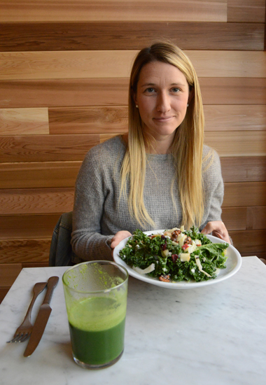 Kristen Beddard with a kale salad, part of her life-changing experiences with The Kale Project in Paris (Photo © Meredith Mullins)
