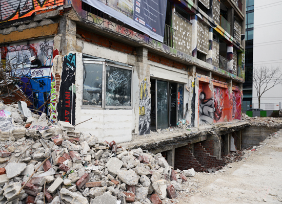 Side of the Tour 13 in Paris after the first phase of demolition, proving the fleeting nature of street art (Photo © Meredith Mullins)