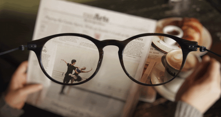 A cinemagraph showing some reading The New York Times, illustrating the beauty of corrected and natural vision. (Image © Jamie Beck and Kevin Burg)