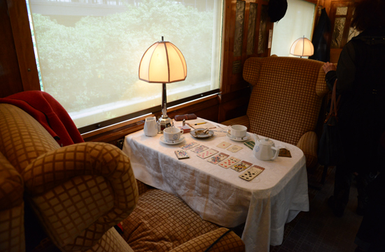 Table set with playing cards in The Orient Express, a train that offered life-changing experiences to travelers crossing two worlds. (Photo © Meredith Mullins)