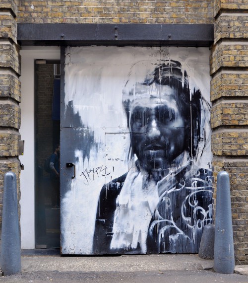 Commissioned portrait on the door of Tramshed, a Shoreditch restaurant by creative street artist and fine artist, Conor Harrington. (Photo © Sheron Long)