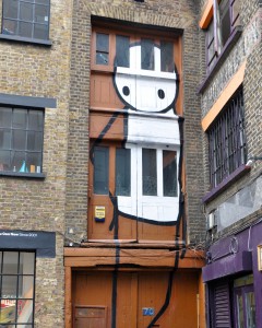 Simple and unassuming stick figure on a building in Shoreditch is from Stik, a creative street artist.  (Photo © Sheron Long)